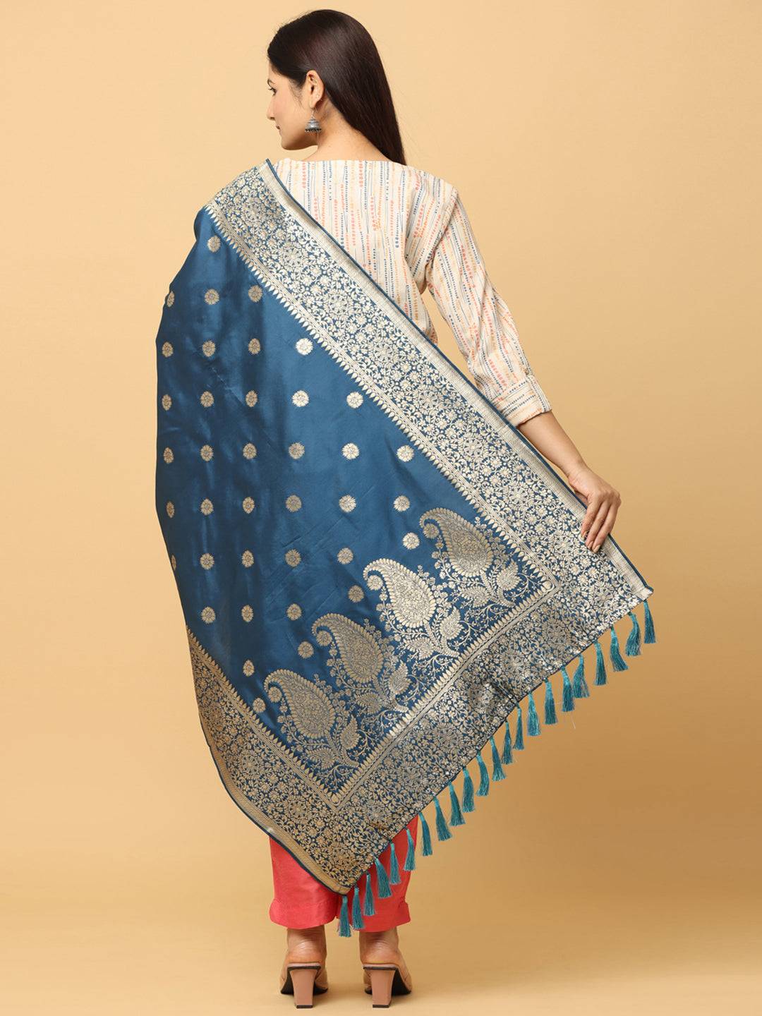 Back view of teal silk blend dupatta with detailed pattern.