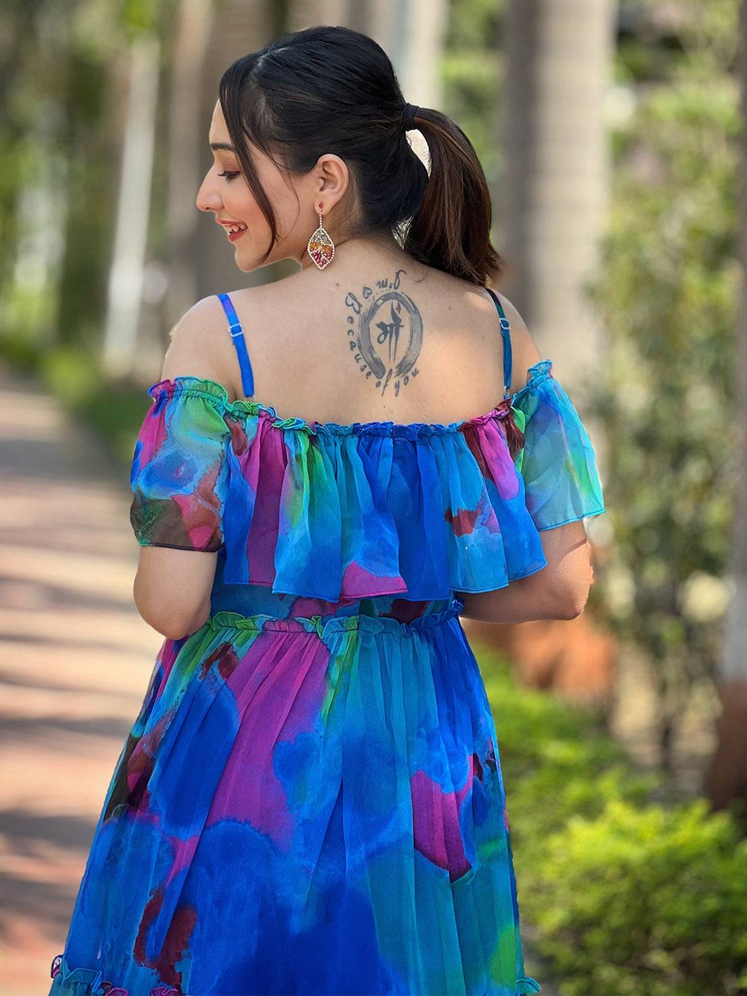 Back view of Persian Blue Abstract Print Dress and tattoo