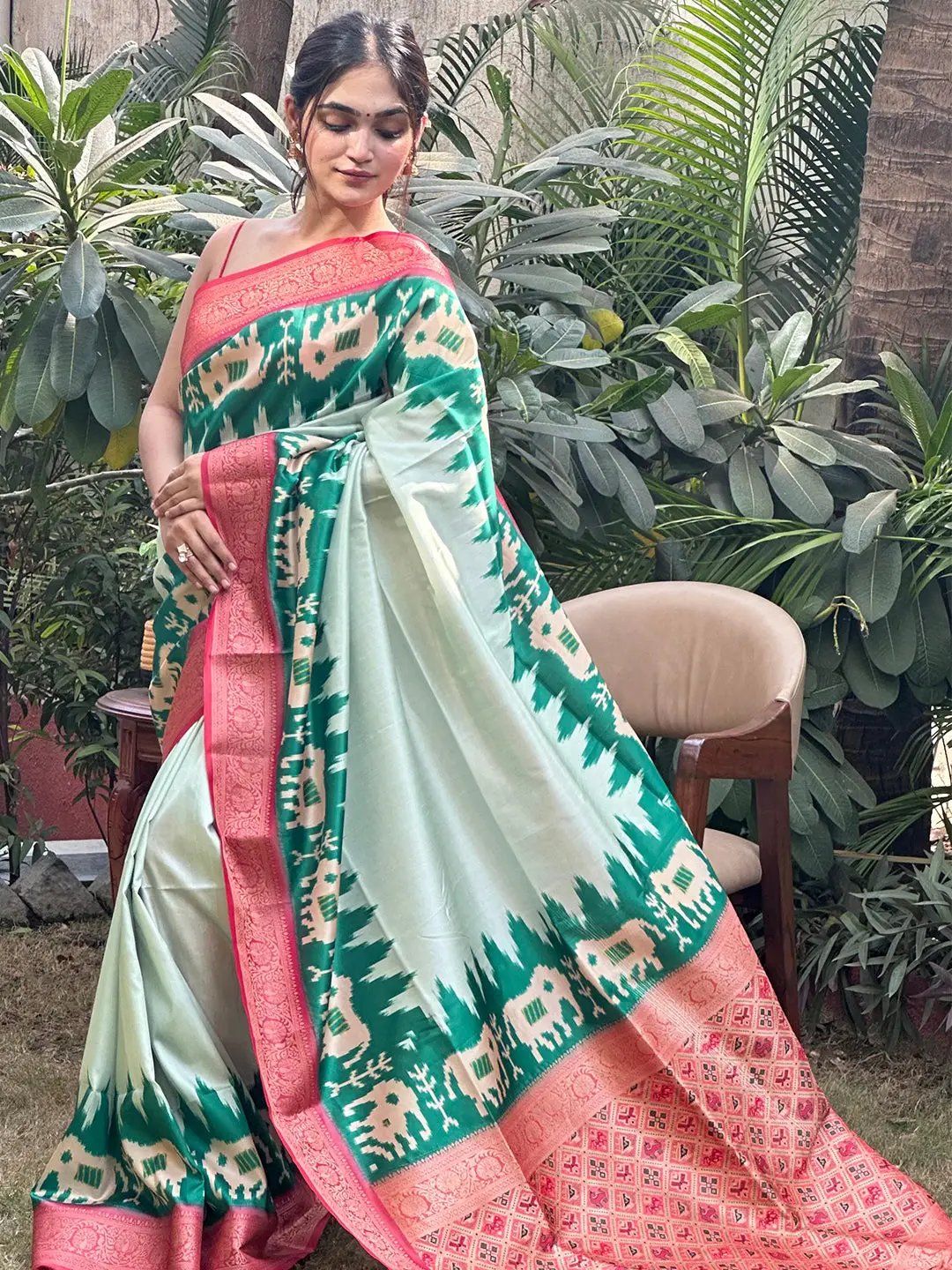 Traditional Banarasi silk saree featuring Zari Patola pallu design