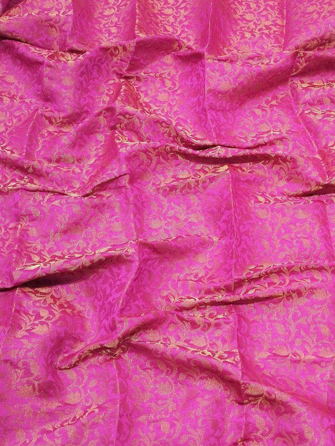 Close-up of pink brocade zari blouse fabric