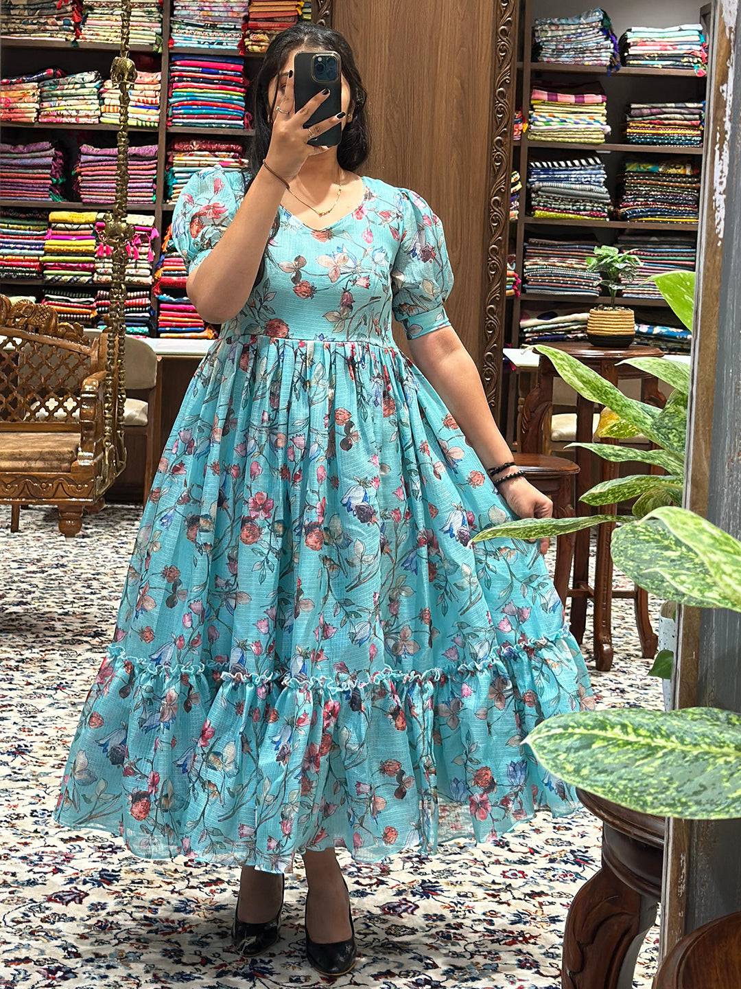 Chic powder blue dress with floral design and flattering fit-and-flare.