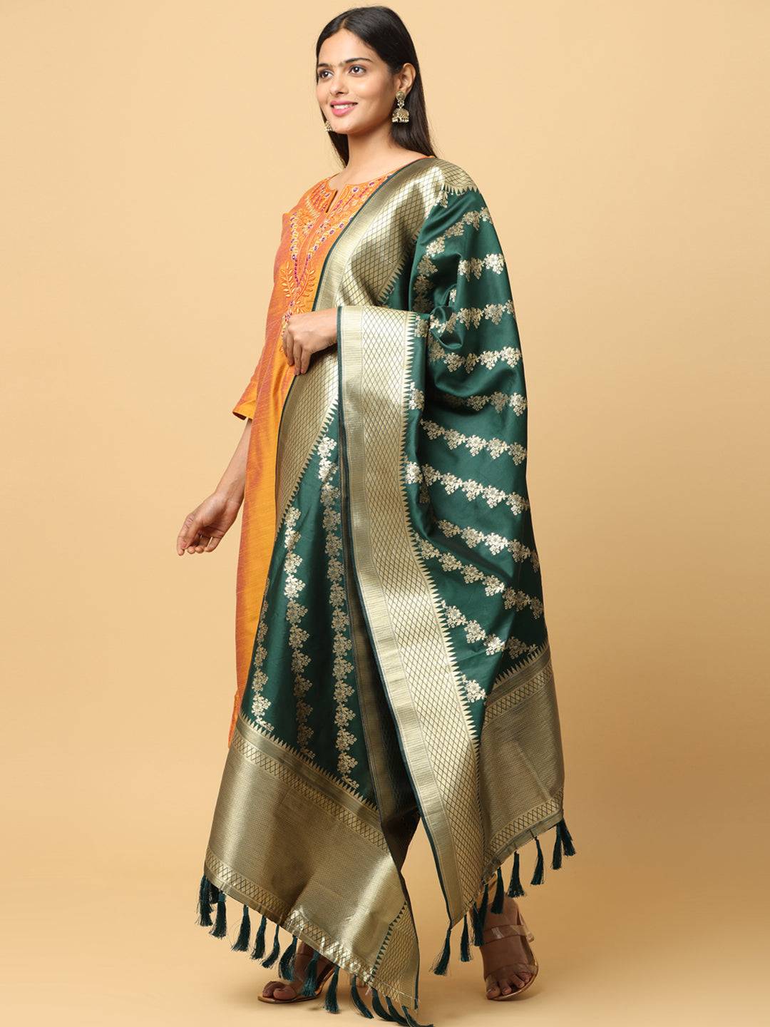 Side view of bottle green dupatta with gold accents