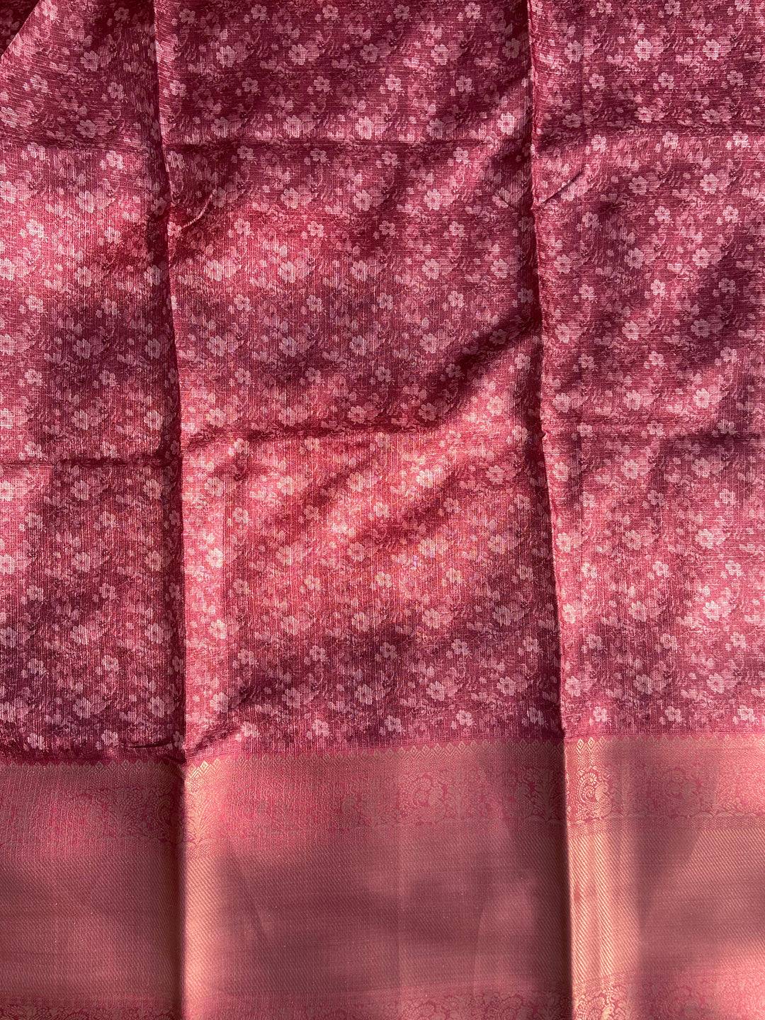 Reverse side of saree with intricate pink floral pattern