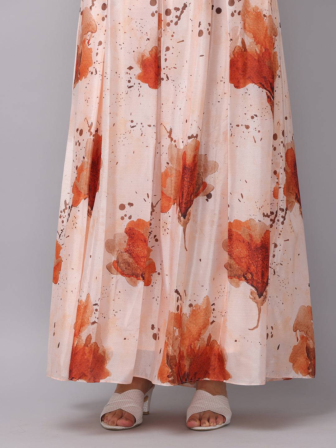 Detail of floral pattern on peach color corset dress.