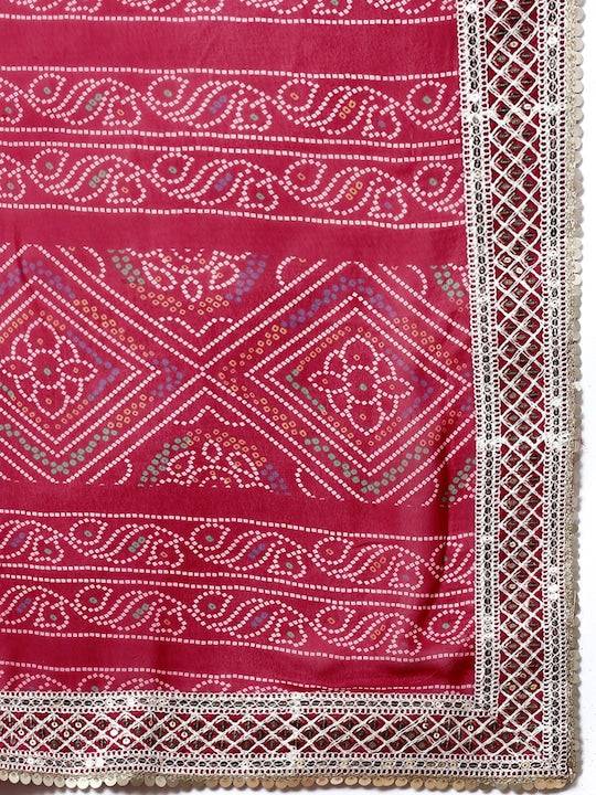 Detailed Bandhani pattern on red saree