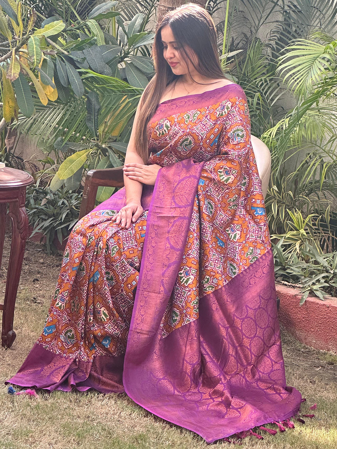 Traditional purple Patola saree with rich patterns