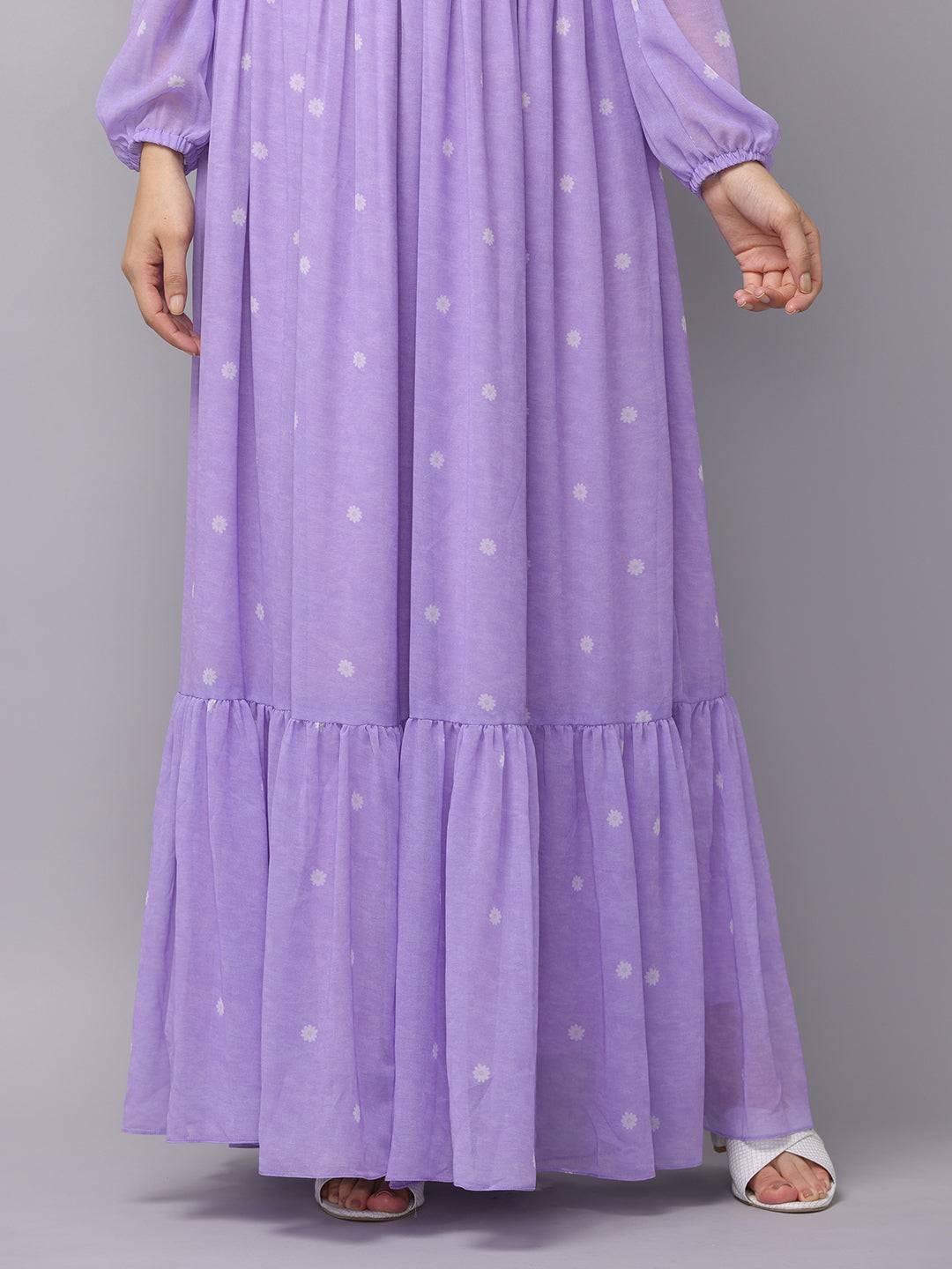 Lilac polka dot smocked maxi dress hem detail