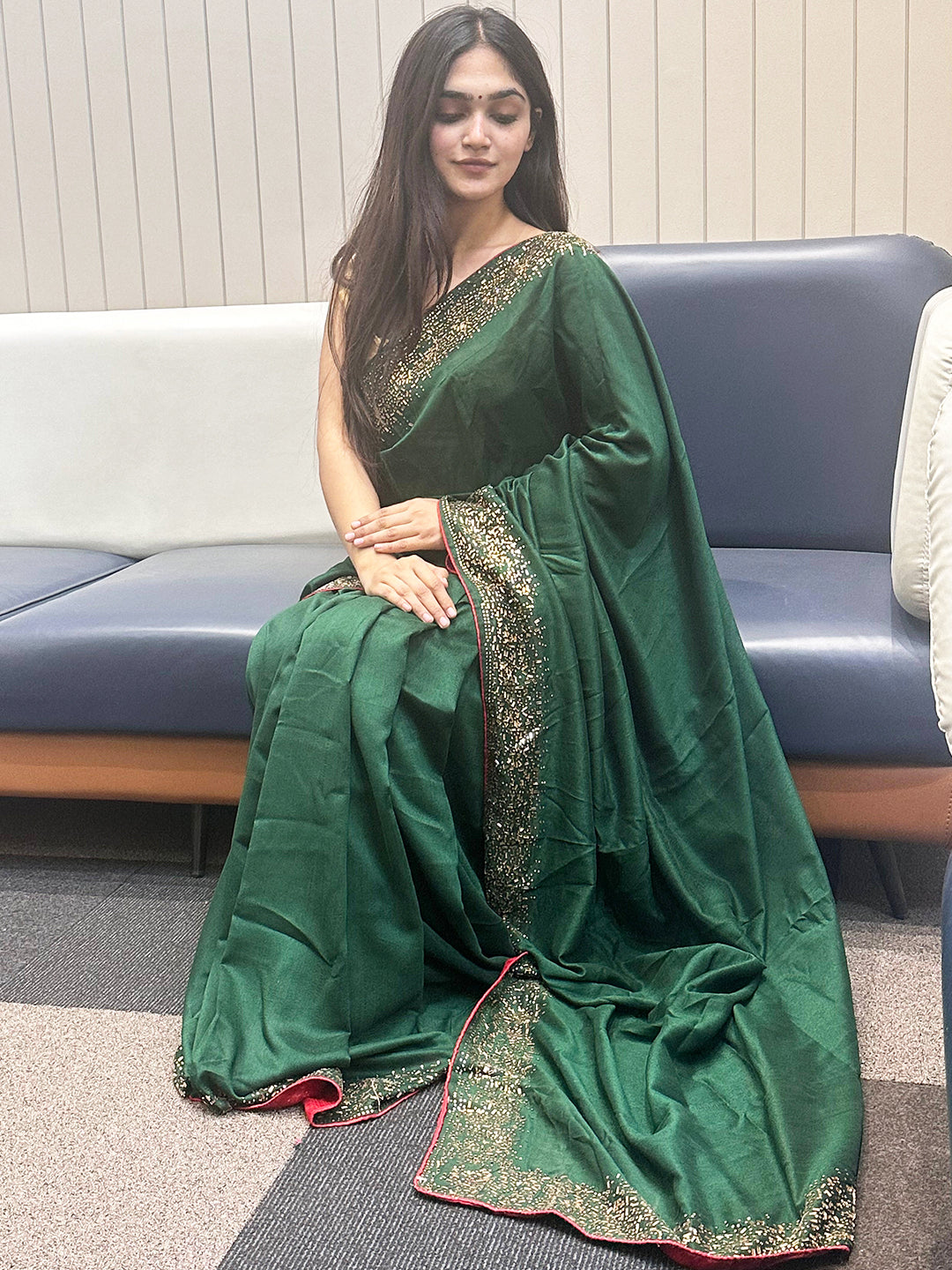 Sitting Pose in Green Saree with Swarovski Details