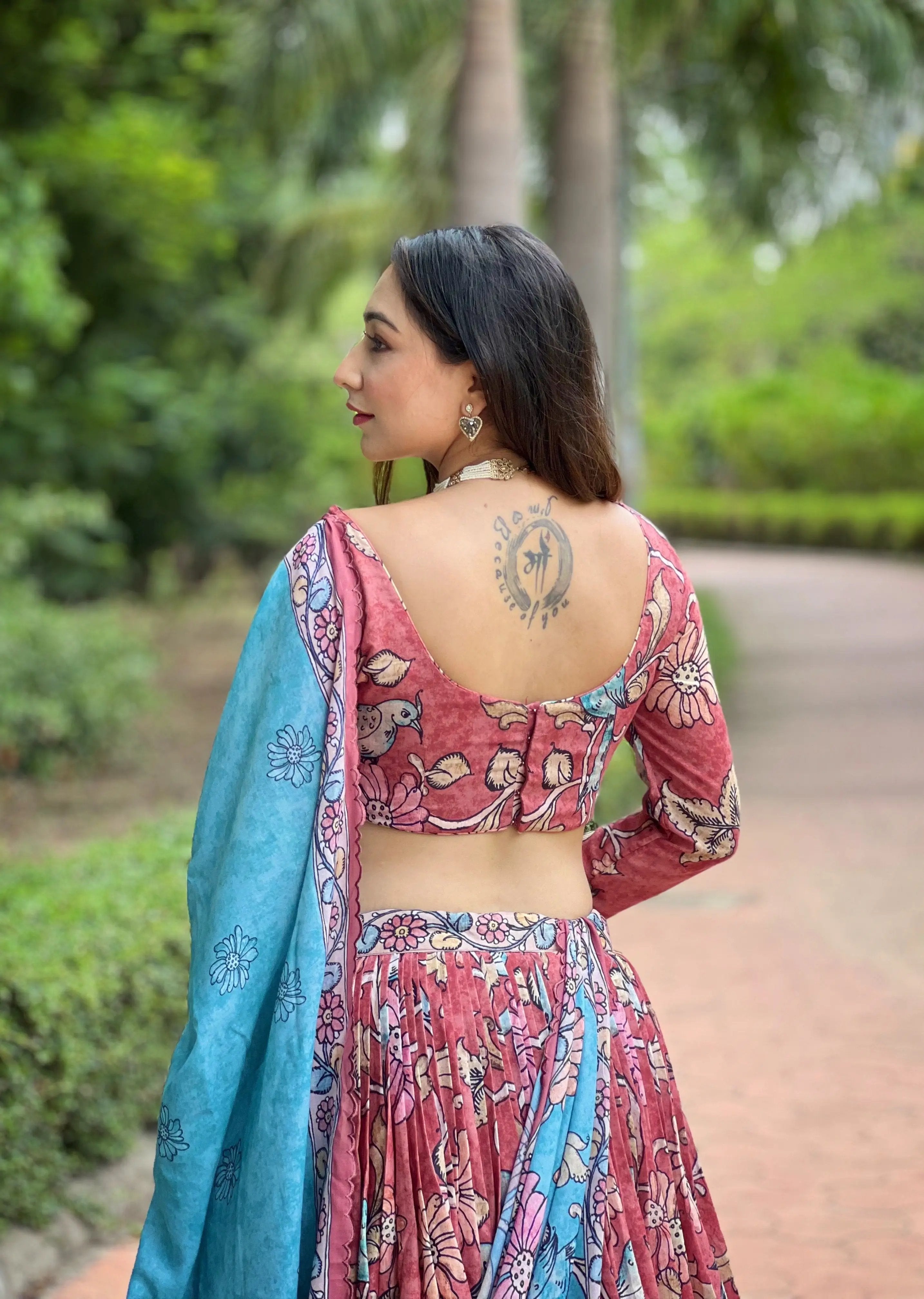 Back view of Tharini Kalamkari Lehenga with tattoo detail