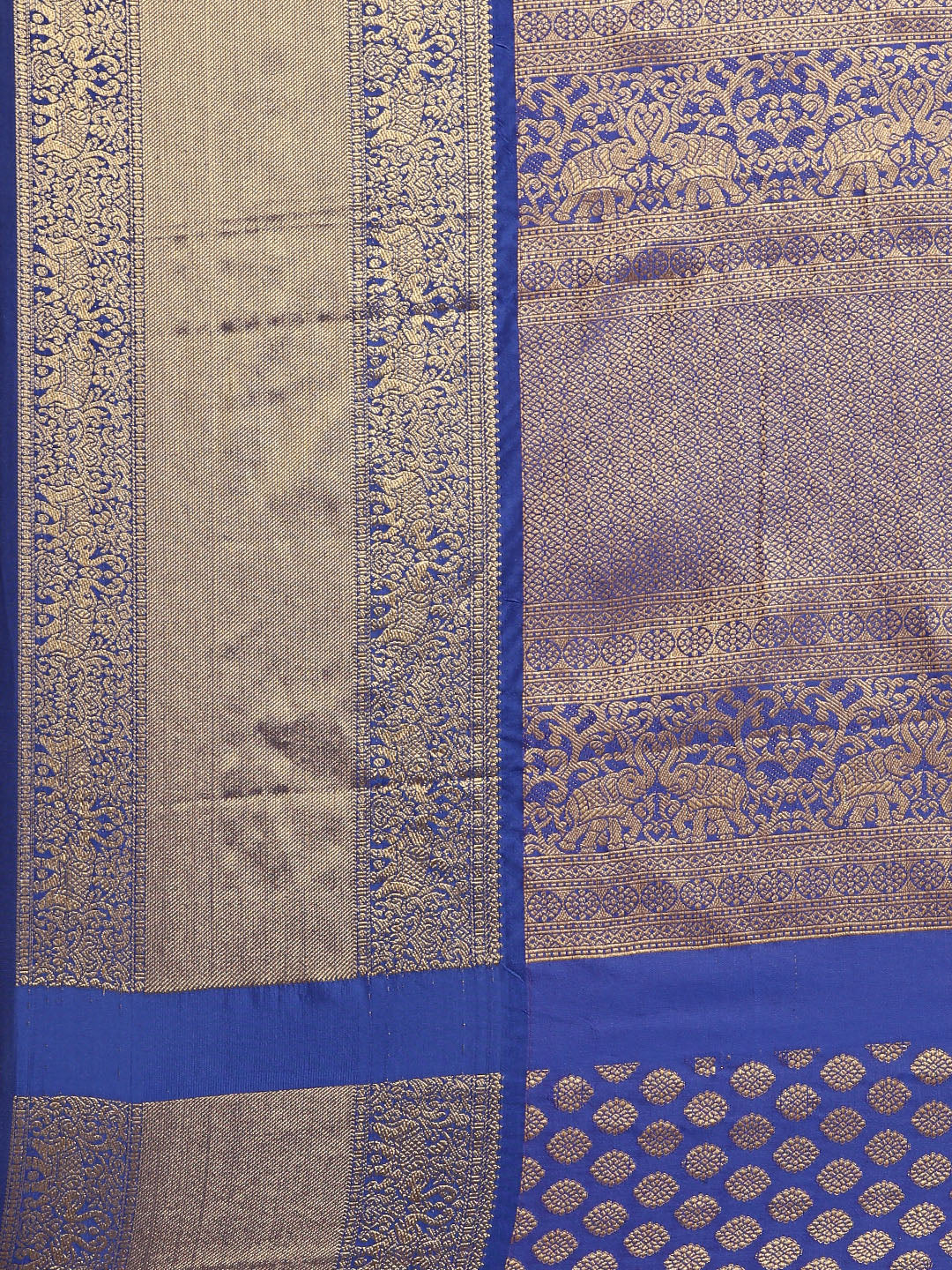 Close-up of blue and gold border on Kanjivaram saree