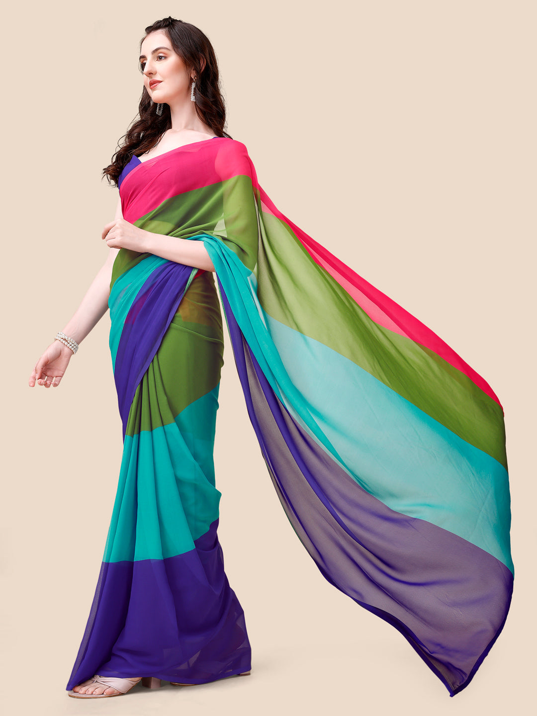 Side view of model in ombre saree with graceful pose