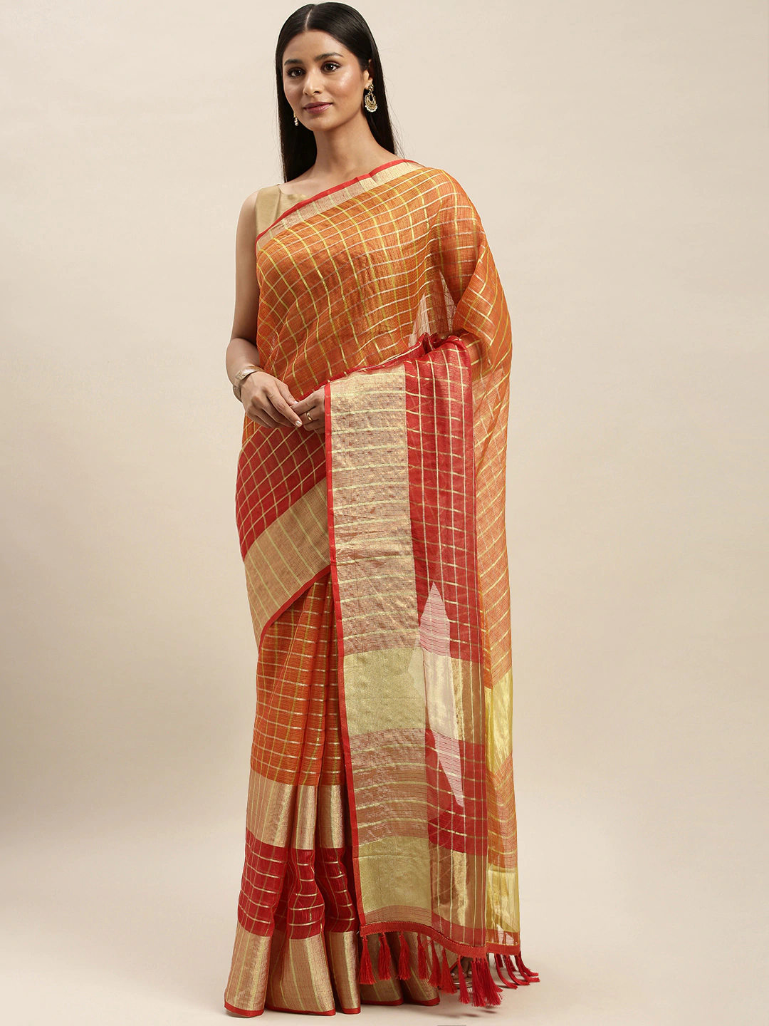 Orange Kota Doria saree with zari butti design, front view