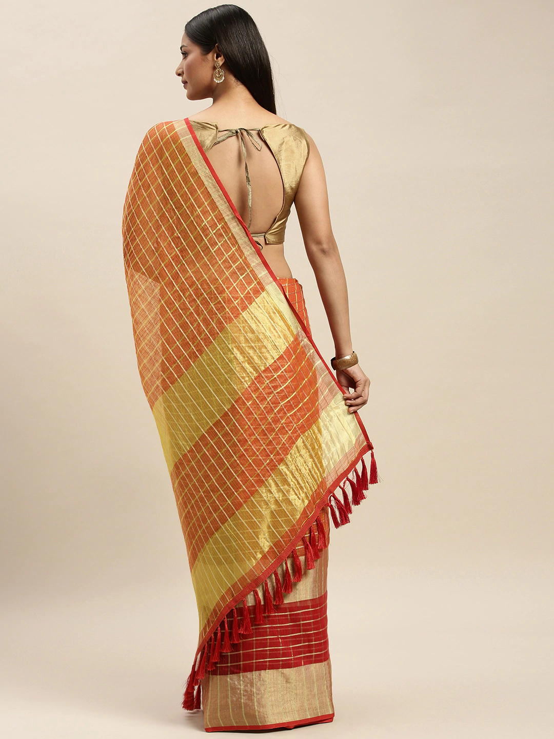 Orange Kota Doria saree with zari butti design, back view