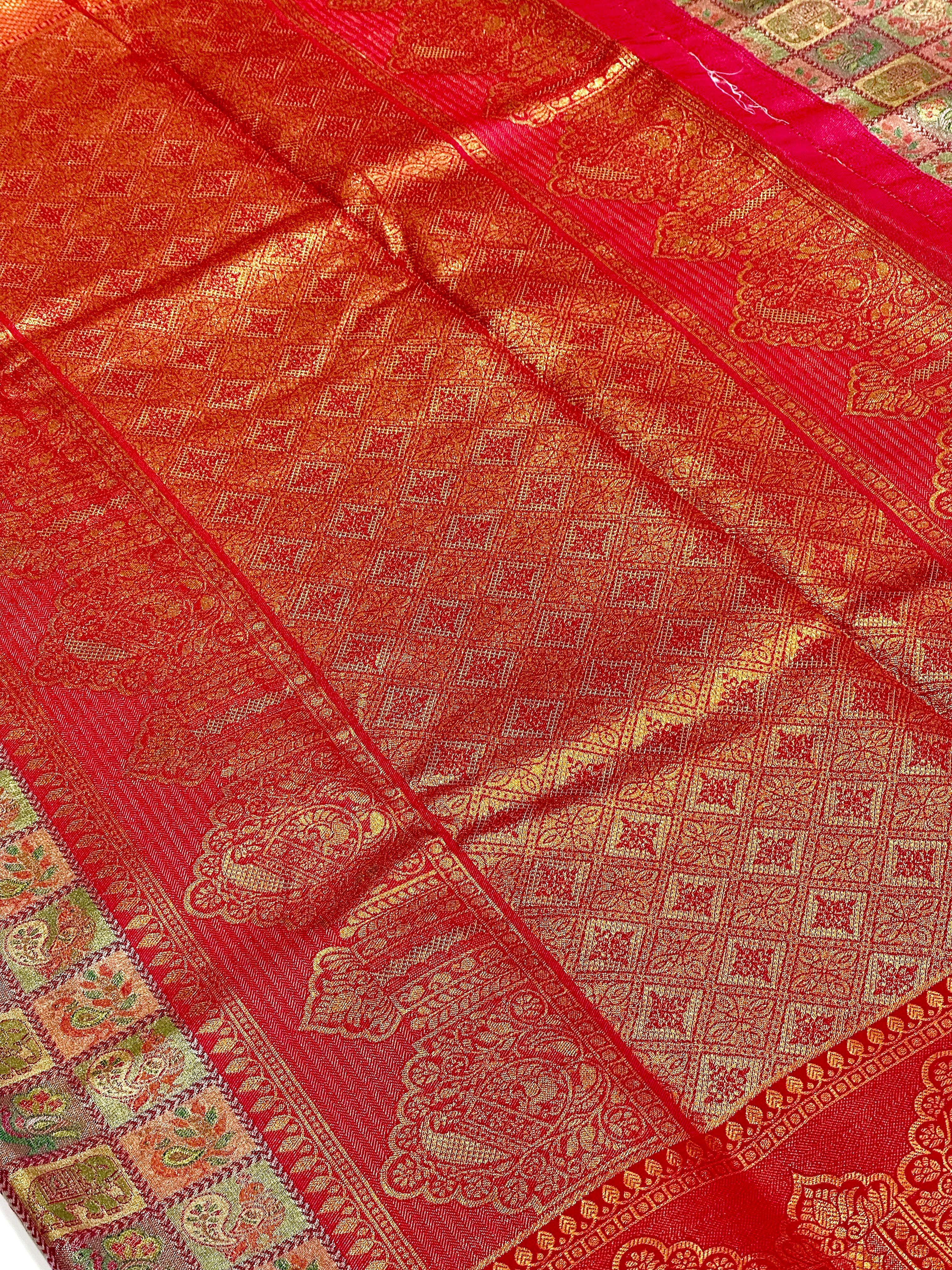 Pink Animal Motif Saree With Gold Zari Border