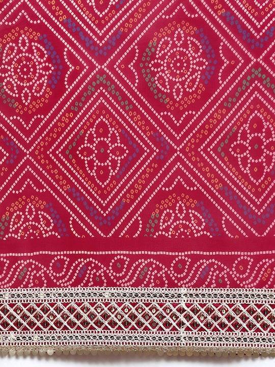 Close-up of Bandhani print on red saree